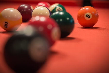 A closeup shot of billiard balls on the billiard table