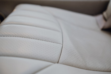 The interior of a car with white leather seatsの写真素材