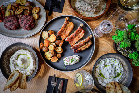 A top view of assorted food set on a table in the restaurantの写真素材