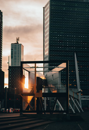 A beautiful view of modern buildings in the city at sunsetの写真素材