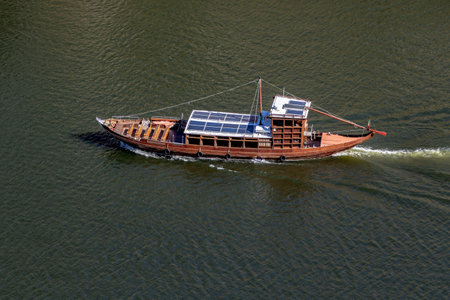 An aerial view of a brown yacht in the sea water in Porto, Portugalの写真素材