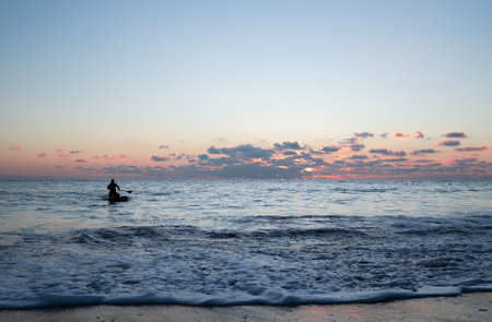 A beautiful shot of a seascape under the cloudy skiesの写真素材