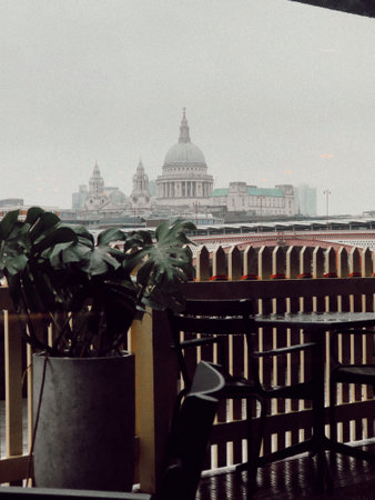 A view of St. Paul's Cathedral from a terrace on a foggy day, London, UKの写真素材