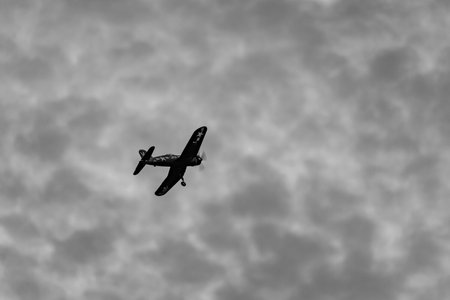A beautiful shot of a toy airplane in the air