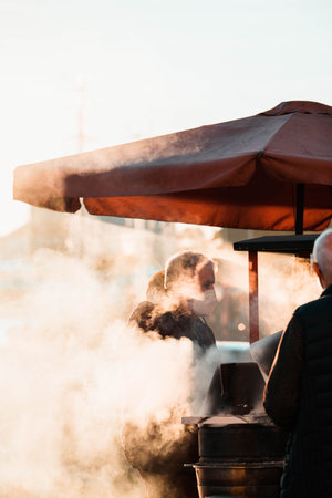 A street food vendor making barbeque