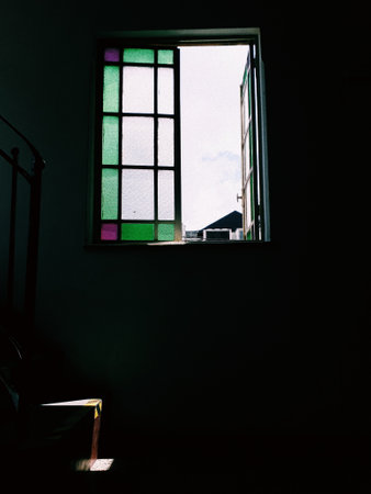 A vertical shot of an open windowの写真素材