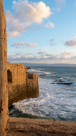 A vertical shot of an old fortress wall and the sea viewのeditorial素材