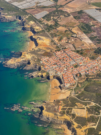 A vertical shot of the Zambujeira do Mar village in Portugalの写真素材