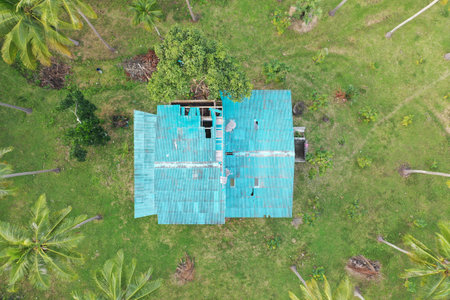 A top view of a blue house in the fieldの写真素材