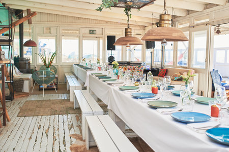A beautifully decorated interiors of a beach restaurant during the day