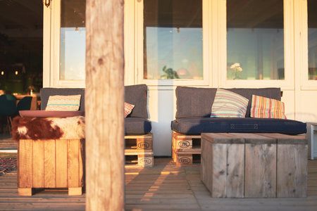 A beautifully decorated interiors of a beach restaurant during the dayの写真素材