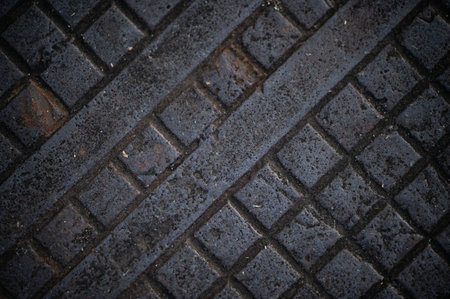 A beautiful shot of a gray concrete brick pavementの写真素材