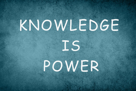 Knowledge is power, phrase on a blue colored background, education concept, strategyの写真素材