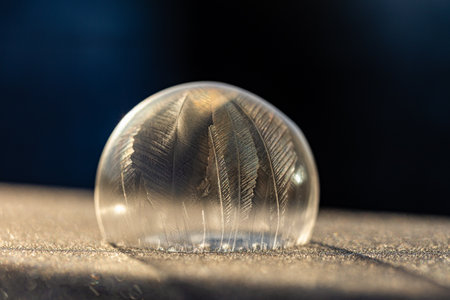 A closeup shot of a frozen soap bubbleの写真素材