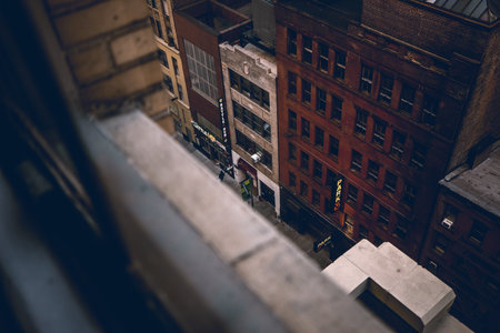 A high angle shot of a street surrounded by some old buildings