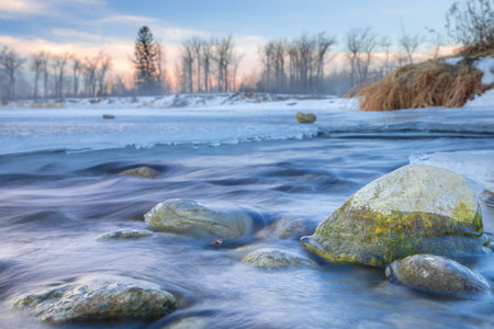 The view of the rocks in the river. Winter landscape.