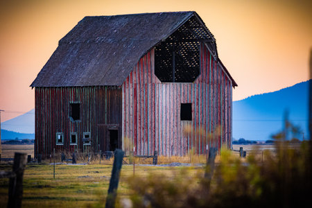 A red barn in a mountainous aの写真素材