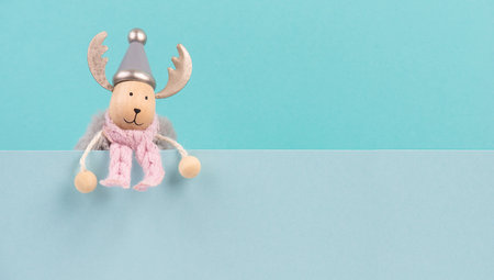 Christmas reindeer, holiday grreeting card, wintertime, copy space, blue color, xmas seasonの写真素材