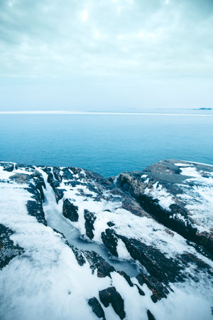 A beautiful shot of a seascape under the cloudy skies