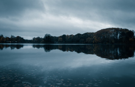 A beautiful shot of a lake in the evening in Lyon, Franceの写真素材