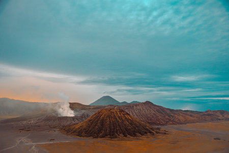 The Bromo Tengger Semeru National Park in Indonesia, with calderas, mountains, and a colorful sky