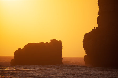 A beautiful shot of a cliffs in Nazare town during the sunset