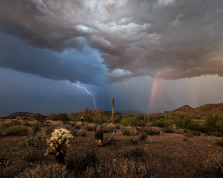 The lightning and the dark clouds over a deserted areaの写真素材