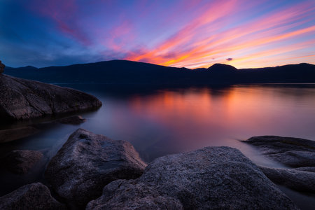 The beautiful view of the sunset above the lake. Vancouver Island, British Columbia, Canada.の写真素材