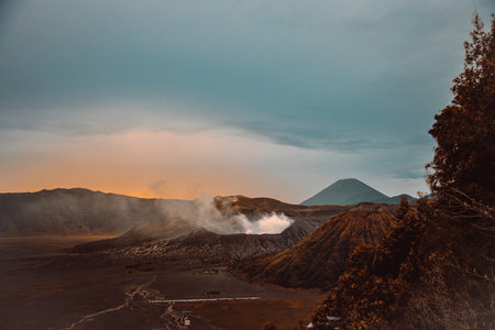 The Bromo Tengger Semeru National Park in Indonesia, with calderas, mountains, and a colorful sky