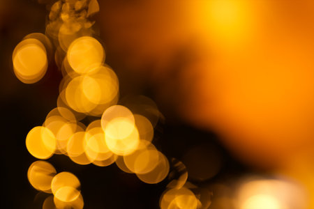 The beautiful orange bokeh lights background.の写真素材