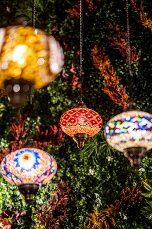 A Shallow focus of lanterns with colorful floral mosaic design