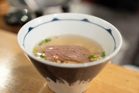 A closeup shot of a bowl of pho with meatの写真素材