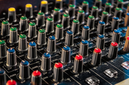 A closeup of a Mixing desk