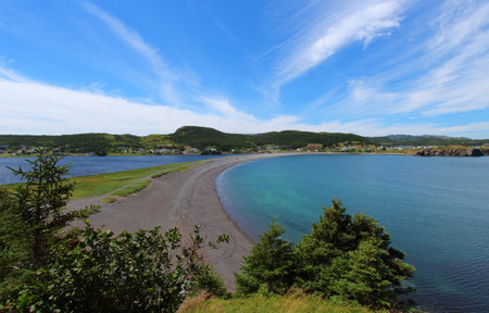 A beautiful shot of a seascape under the cloudy skies during the dayの写真素材