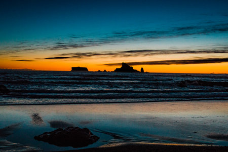 A beautiful shot of a lake with sunset in the backgroundの写真素材