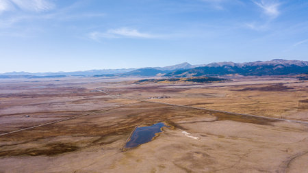 An autumn landscape with a view of the Rocky Mountains in Colorado, USA