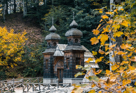 A scenic view of the wooden Russian Orthodox chapel on Vrsic mountain pass in Slovenia