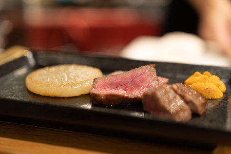 A closeup shot of slices of gourmet medium rare steakの写真素材
