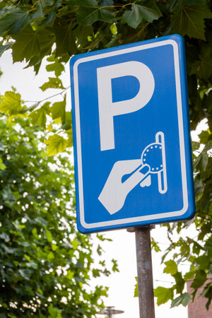 A closeup of parking sign in the streetの写真素材