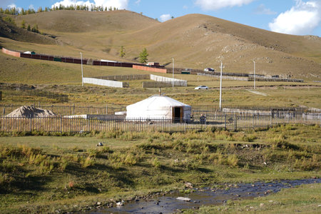 A beautiful view of a farm landscape with fences and buildings