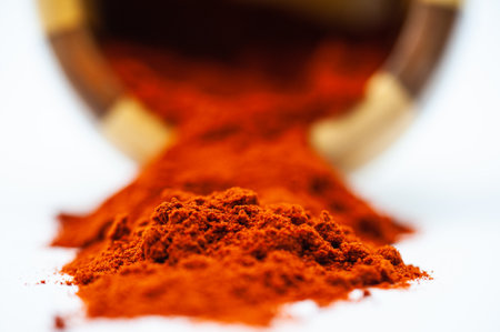 A closeup of a bowl of red pepper spice. Selected focus.の写真素材
