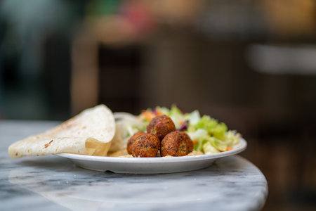 Plate of falafel balls and chickpeas, Singapore