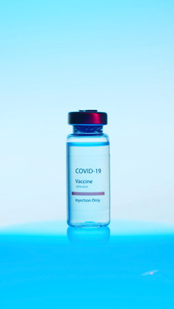 Dose Of Vaccine In Little Bottle Isolated On Bright Background. Ideal Concept For Corona, Covid-19,...