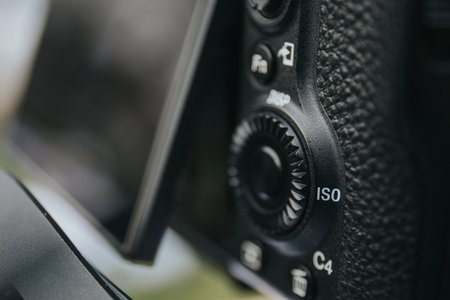 A selective focus shot of iso button of a digital camera with flip screenの写真素材