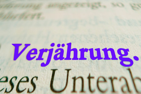 A selective focus of a german word in purpleの写真素材