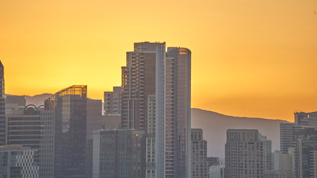 The modern skyscrapers during the orange sunset