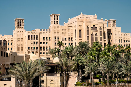 The famous luxury Jumeirah Mina A'Salam hotel in Dubai against a blue skyの写真素材