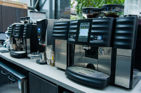 Various coffee making machines on a shelf