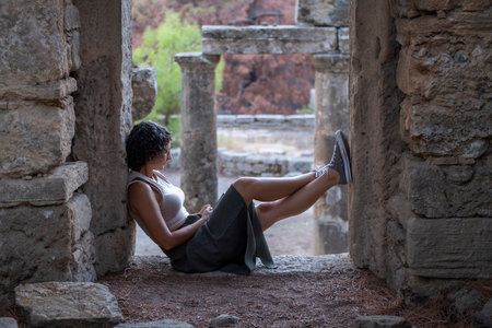 A photo of a white Caucasian woman in Antalya, the ancient city of Lyrbe, Manavgat, Turkeyの写真素材