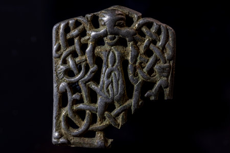 A closeup shot of Viking Age brooch in silverの写真素材